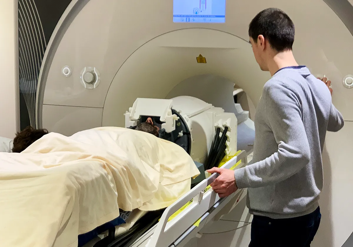 A research participant undergoing ultrasound neuromodulation during an MRI scan